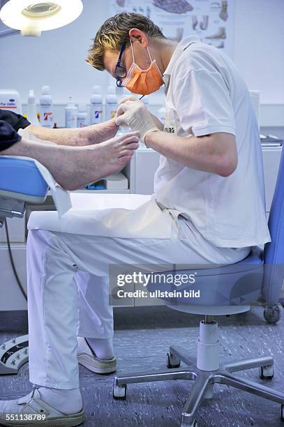 Germany, Iserlohn: More than just foot care is the work of podiatrists in his practice. The helper for footwear, walking and running is an important...