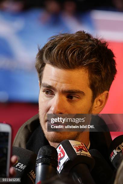 Berlin, Germany, April 15, 2014: Actor Andrew Garfield gives an interview at the film premiere of "The Amazing Spiderman 2 - Rise Of Electro".