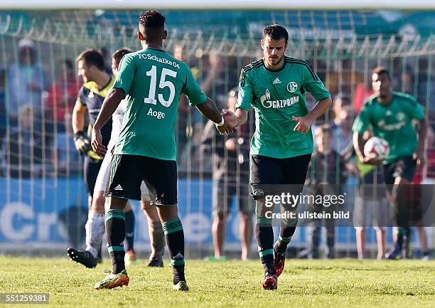 Tranquillo Barnetta klatsch mit Dennis Aogo ab nach seinem Tor, waehrend dem Vorbereitungsspiel zur DFL Saison 2014/2015. DJK Rosenheim gegen Schalke...