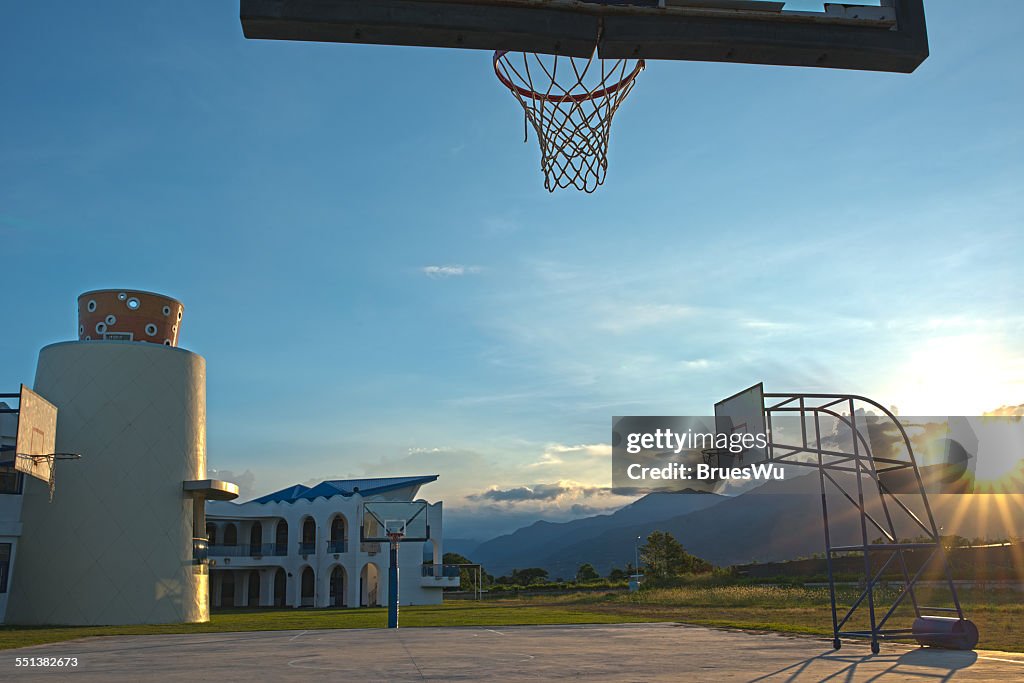 Empty basketball court at school