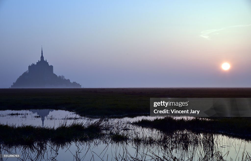 UNESCO Mont saint michel landscape with sunrise