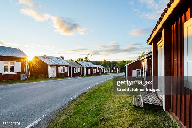 wooden buildings at dusk - lulea - fotografias e filmes do acervo