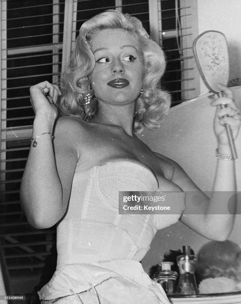Portrait Of Actress Sheree Winton Wearing A Corset And Looking In A portrait-of-actress-sheree-winton-wearing-a-corset-and-looking-in-a