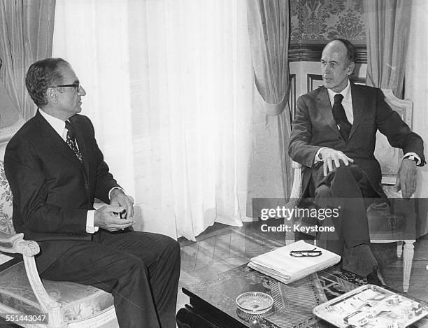 French President Valery Giscard D'Estaing talking to the Shah of Iran during a visit to France, at the Elysee Palace, Paris, circa 1975.