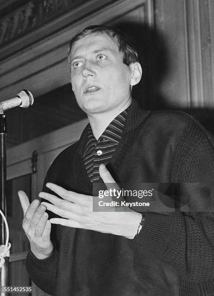 Russian poet Yevgeny Yevtushenko speaking at a press conference in Paris, circa 1965.