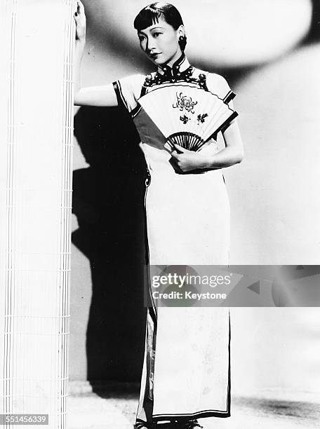 Portrait of singer Anna May Wong wearing traditional Chinese clothing, circa 1935.