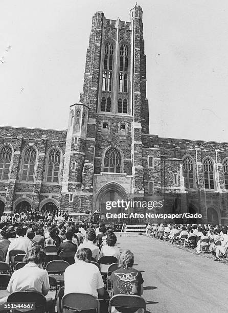 The Castle on the Hill, as City College Baltimore was known, and Graduation ceremony taking place in the open air, May 14, 1980.