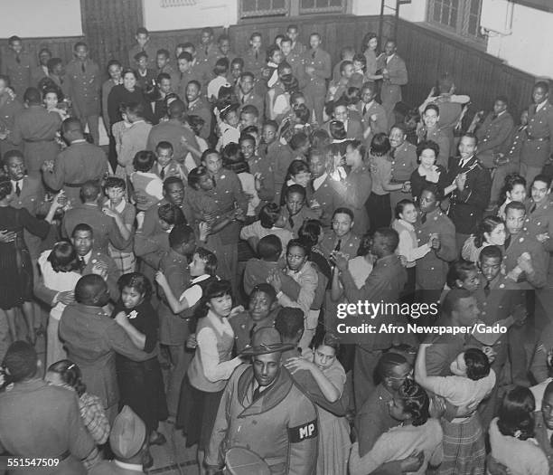 Dance for African-American soldiers and their wives and girlfriends in World War Two, the United Services Organization in action, February 2, 1943.