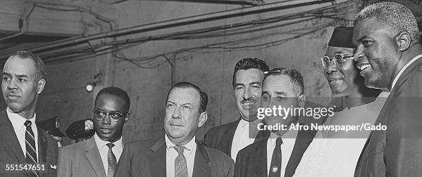 Group of men, African-American and Caucasian with Senator Robert Wagner, mayor of New York city, New York City, New York, 1959.