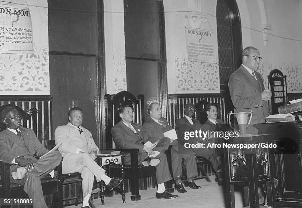 Max Yergan, member of the council for United Aid for People of African Descent, addressing a rally, 1940.