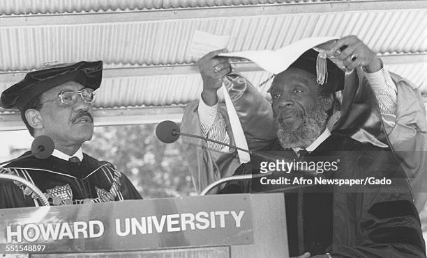 Two men at Harvard University at an event in full regalia, academic dress, Dr James Church and author and satirist Dick Gregory, Boston,...