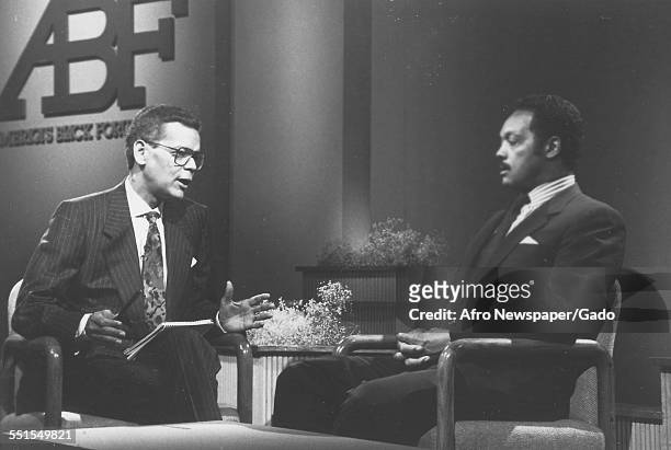 Jesse Jackson, pastor, politician and civil rights campaigner, being interviewed in a television studio, by a man, on the ABF programme, New York...