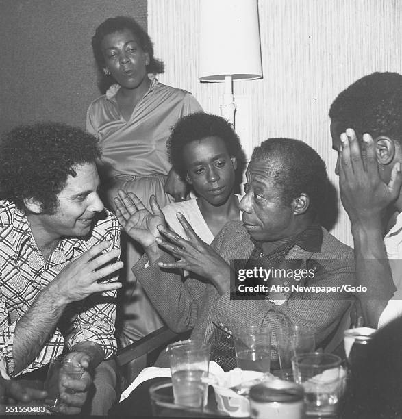 Barry Feinstein, actresses Cassandra Jamison and Michelle Brown, and James Baldwin playwright of Blues for Mr Charlie, December 7, 1980.