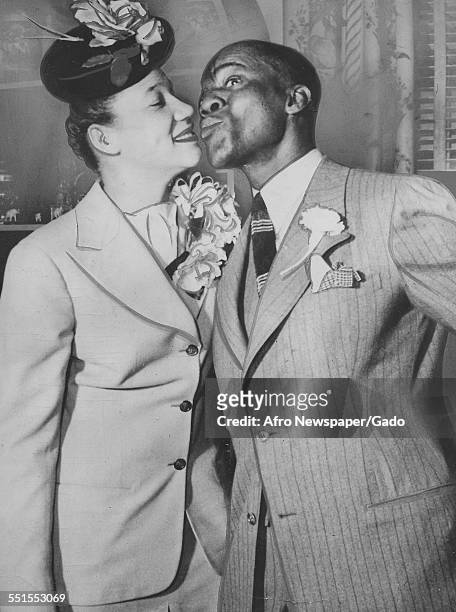 Bill Robinson the entertain Bojangles and his third wife Elaine Plaines side by side posing for a photograph and celebrating their marriage, January...