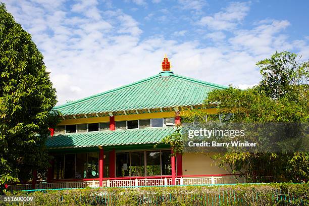 sloped roofs of chinese buddhist temple, honolulu - honolulu culture stock pictures, royalty-free photos & images