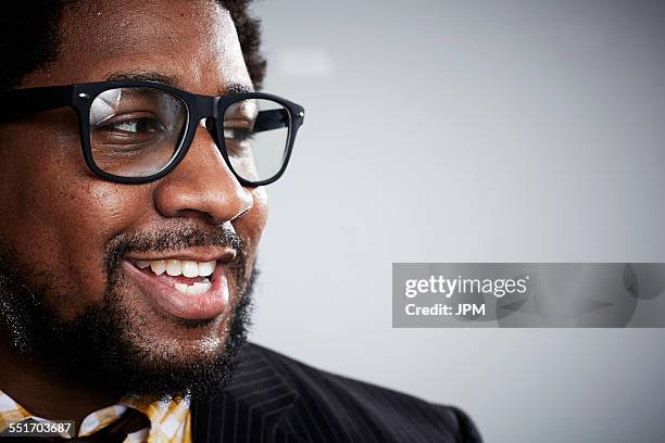 close up studio portrait of mid adult businessman looking sideways - shirt and tie close up stock pictures, royalty-free photos & images