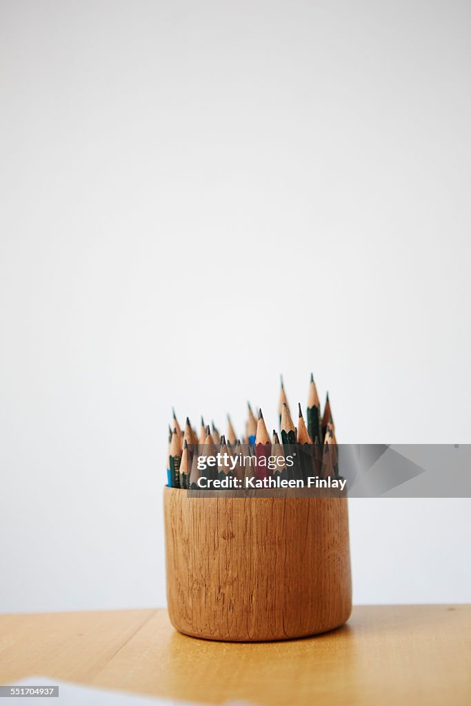 Colouring pencils in pot