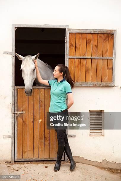 young woman with a horse - 馬の衣装 ストックフォトと画像