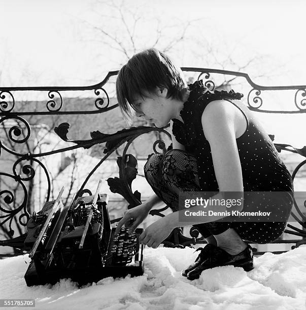 Girl Using Typewriter Typewriter Girl Photos and Premium High Res Pictures - Getty Images