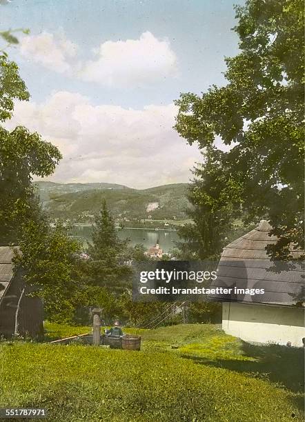 Woerthersee. View to Maria Woerth. Carinthia. About 1920. Handcolored lantern slide.