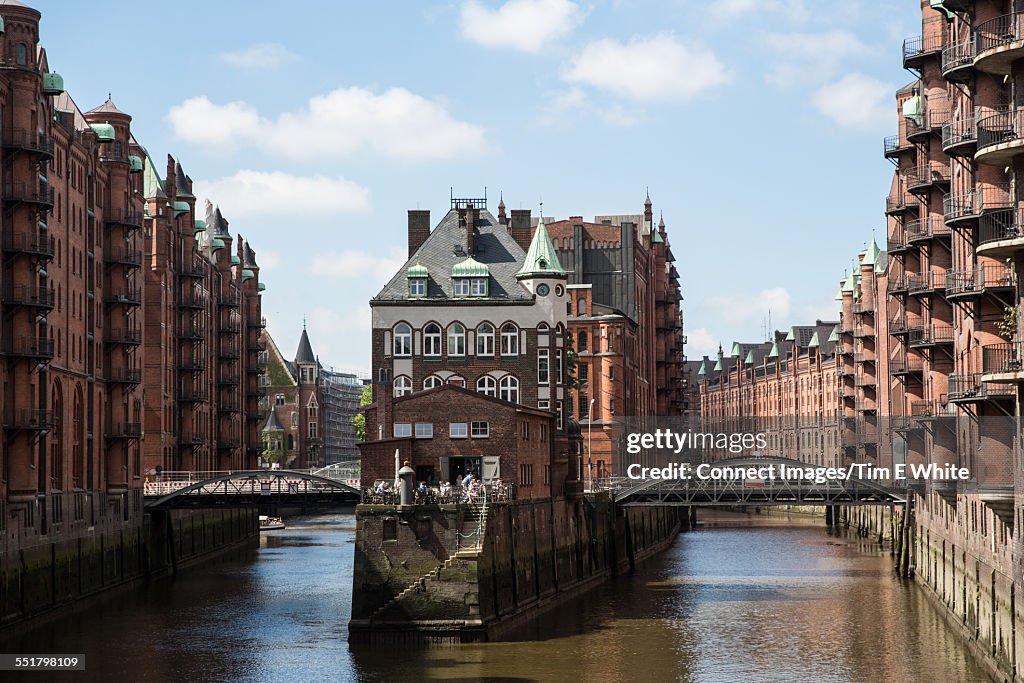 View of warehouse waterfront and bridges, HafenCity, Hamburg, Germany