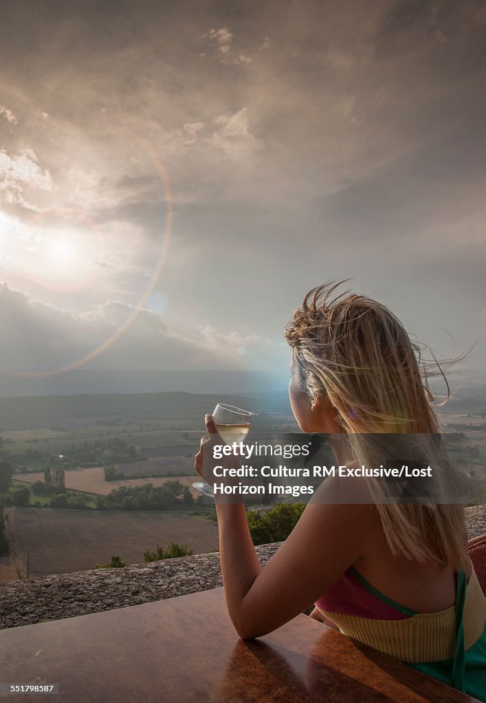 Woman with white wine on vacation, Velonsole, Provence, France