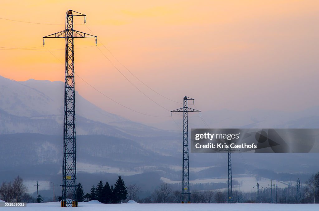 Electric power transmission lines at dusk in Japan