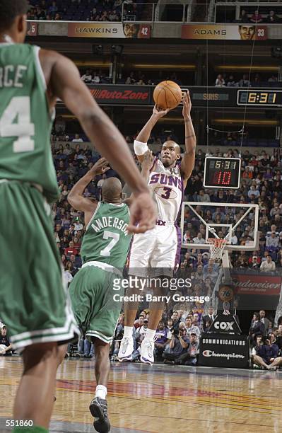 Point guard Stephon Marbury of the Phoenix Suns shoots over point guard Kenny Anderson of the Boston Celtics during the NBA game at America West...