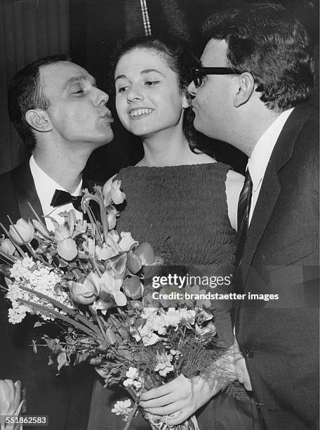 Euro Vision Song Contest 1964 in Copenhagen Tivoli. The Italian winner Gigliola Cinquetti with lyricist Mario Panzeri and the conductor Gianfranco...