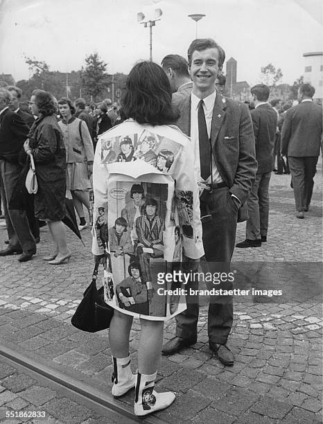 Beatles fan in front of the Grugahalle in Essen. The second Gig of the Beatles in Germany. 25 June 1966 photograph. .