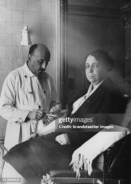 The Polish-French physician Dr. Jaworski has developed a makeover by blood injections. About 1930. Photograph.