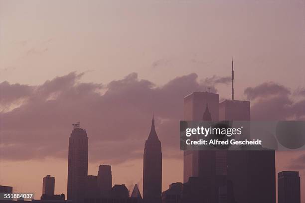 Lower Manhattan at dusk, showing the twin towers of the World Trade Center, New York City, 1983.