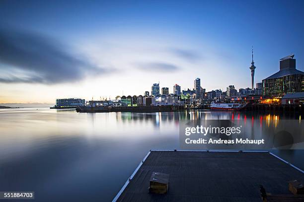 view of auckland skyline at sunrise - auckland sky tower bildbanksfoton och bilder