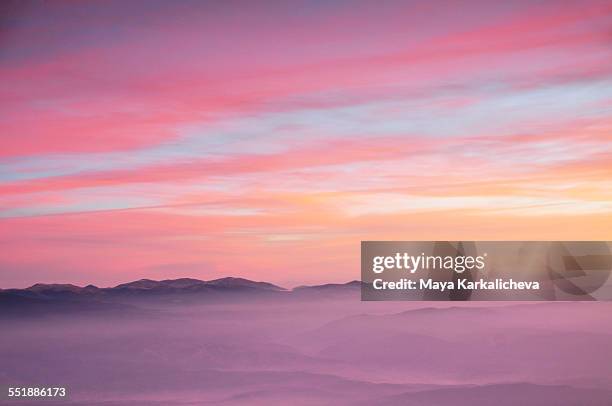 aereal view of pink sunrise in a mountain - pink cloud sky stock pictures, royalty-free photos & images