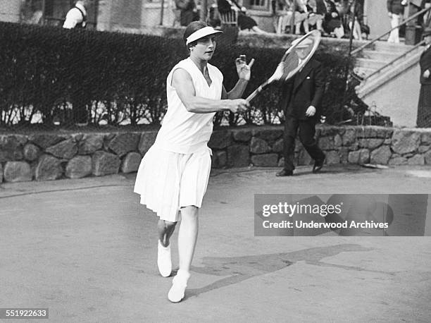 Helen Wills Moody begins a two week practice session at the West Side Tennis Club on Long Island before sailing to Europe to defend her Wimbledon and...
