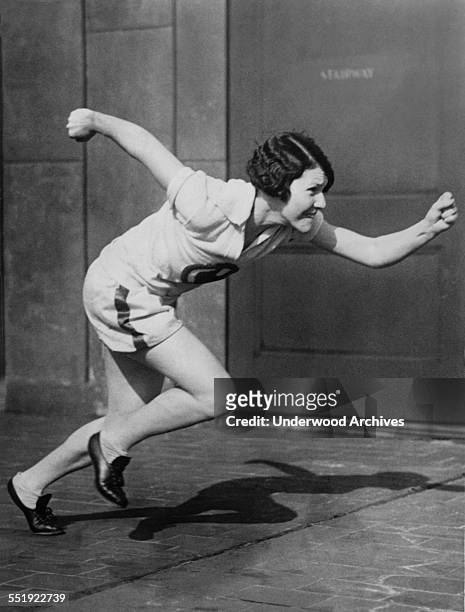 Track star Catherine Donovan, holder of the indoor 800 meter record, training for the 1928 Olympics, Newark, New Jersey, January 1928.