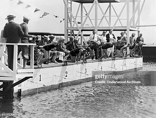 The start of the women's 100 meter freestyle at the National AAU Swimming Championship meet being held at the Biltmore Shore Yacht Club on Long...