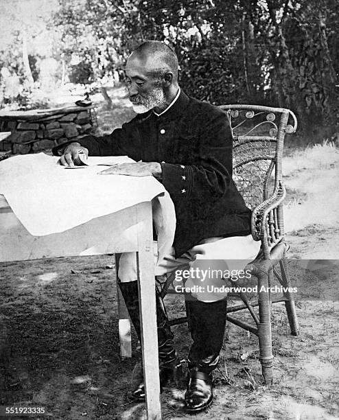 Japanese General Nogi Maresuke studying his siege map at his headquarters during the Russo-Japanese War, Port Arthur, Manchuria, September 13, 1904.