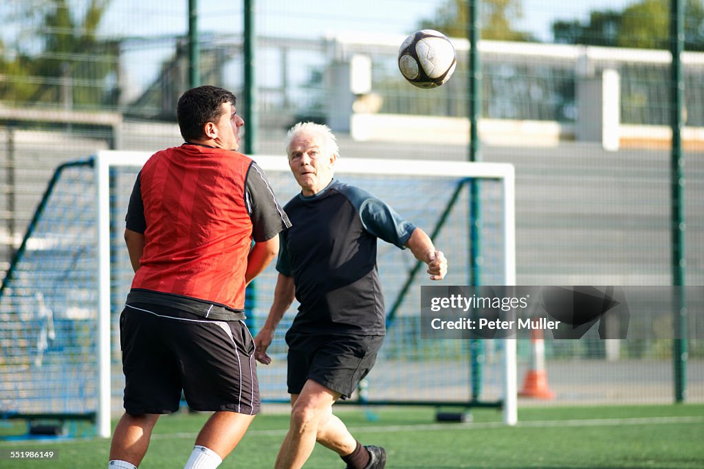 Men playing football