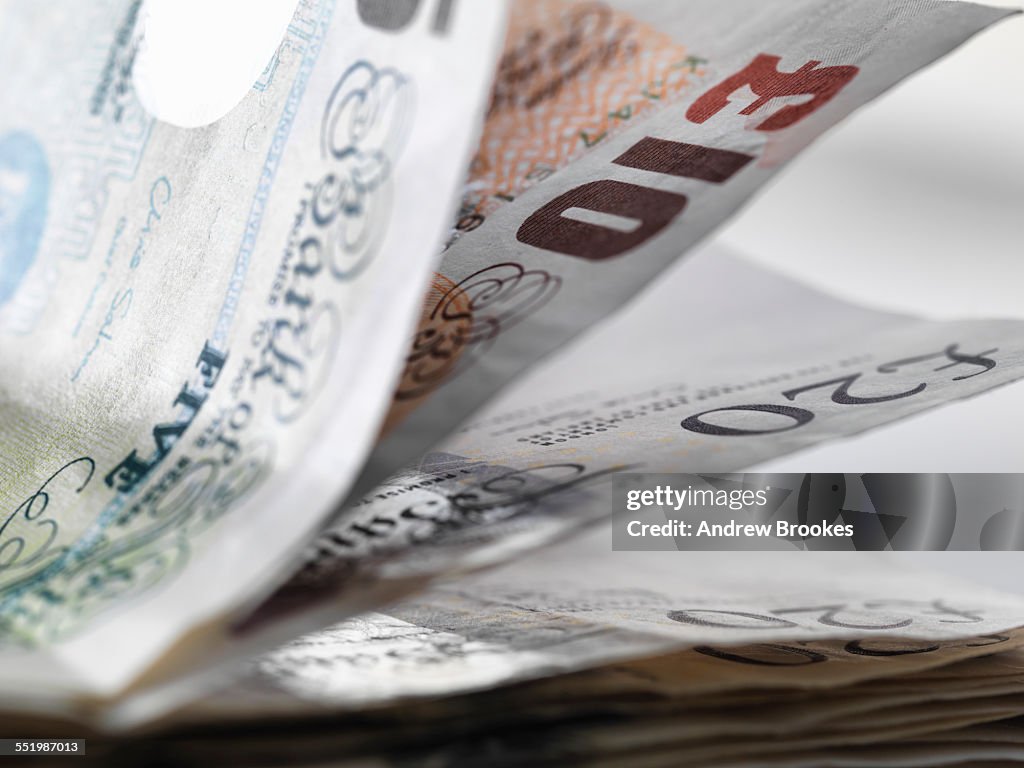 Close up detail of a stack of British banknotes