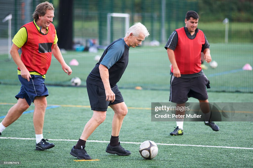 Men playing football