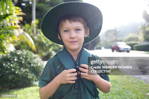 young boy walking to school in australia - pojkscout bildbanksfoton och bilder