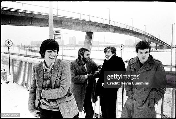 English post-punk band Joy Division in Hulme, Manchester, 6th January 1979. Left to right: drummer Stephen Morris, bassist Peter Hook, guitarist...