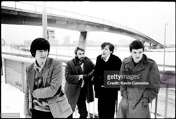 English post-punk band Joy Division in Hulme, Manchester, 6th January 1979. Left to right: drummer Stephen Morris, bassist Peter Hook, guitarist...
