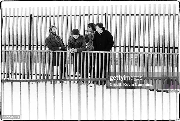 English post-punk band Joy Division in Hulme, Manchester, 6th January 1979. Left to right: bassist Peter Hook, singer Ian Curtis , drummer Stephen...