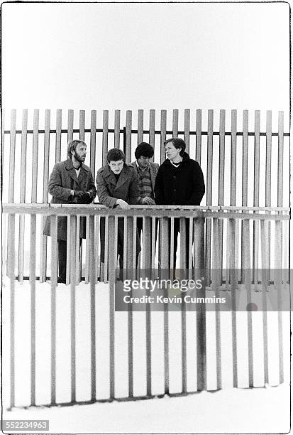 English post-punk band Joy Division in Hulme, Manchester, 6th January 1979. Left to right: bassist Peter Hook, singer Ian Curtis , drummer Stephen...