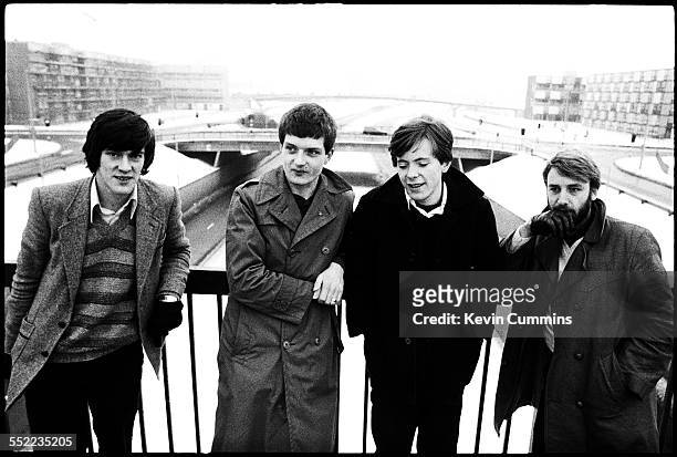 English post-punk band Joy Division in Hulme, Manchester, 6th January 1979. Left to right: drummer Stephen Morris, singer Ian Curtis , guitarist...