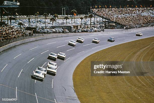 Race cars on the banking at the Daytona International Speedway race track, Daytona Beach, Florida, USA, circa 1960.