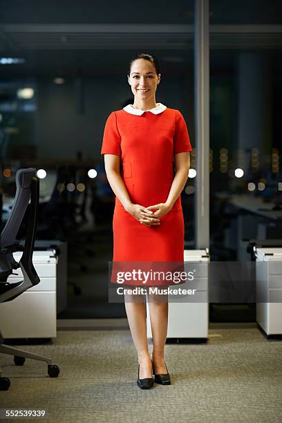 businesswoman - red dress stock pictures, royalty-free photos & images