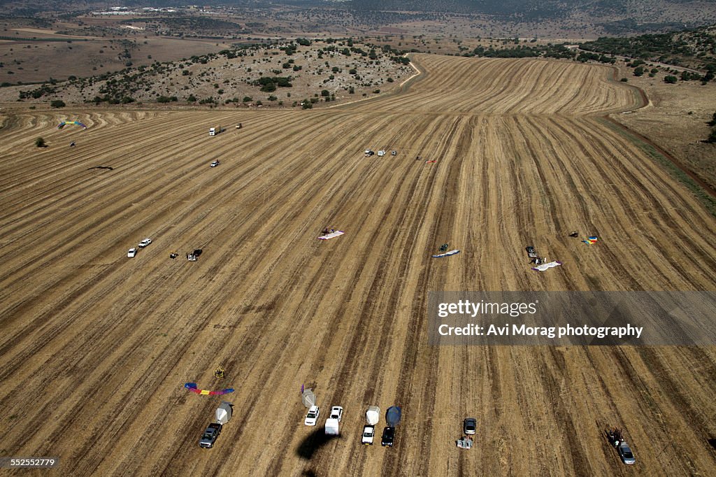 Aerial view of field with Motorized Paragliders